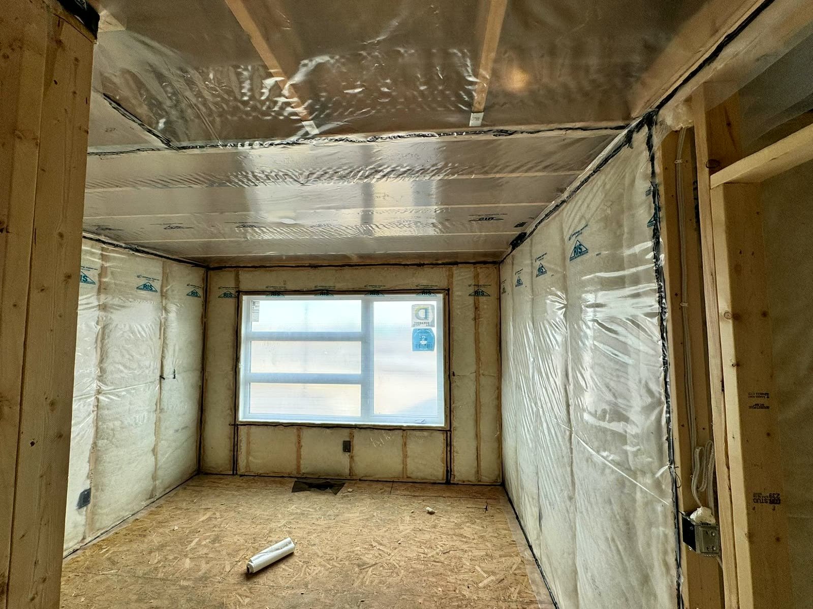 New build bedroom with insulation and sealed poly vapour barrier